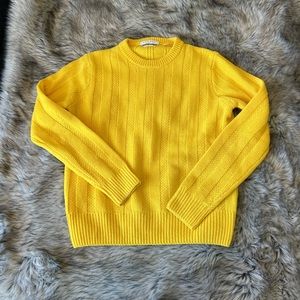 Mens Sandro cable-knit sweater.